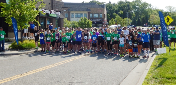 photos of runners about to start a community race