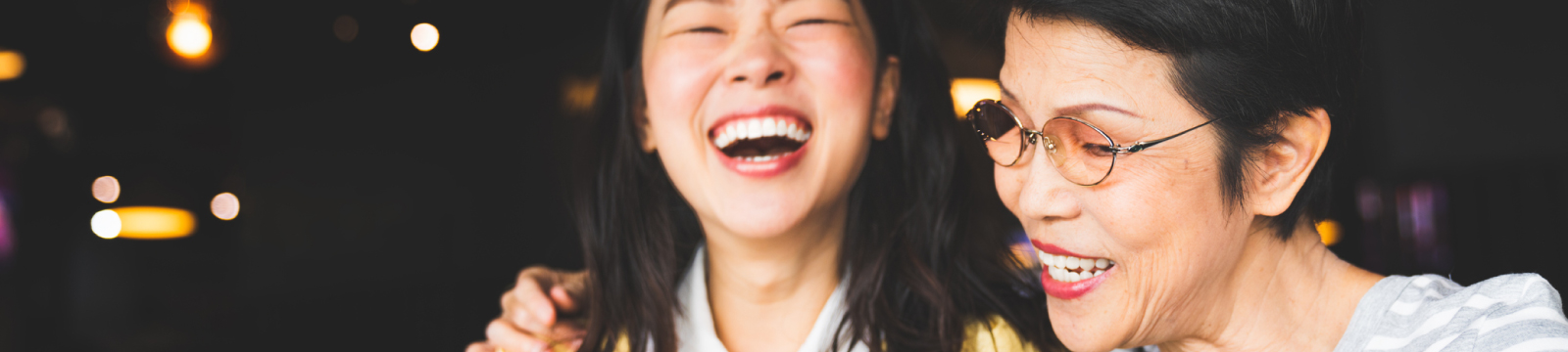 Mother and daughter laughing with good conversation