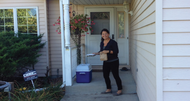 bank volunteer delivering meals on wheels