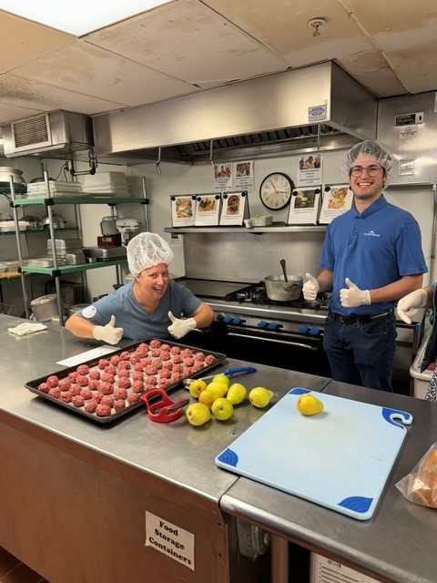 Volunteering in the kitchen.